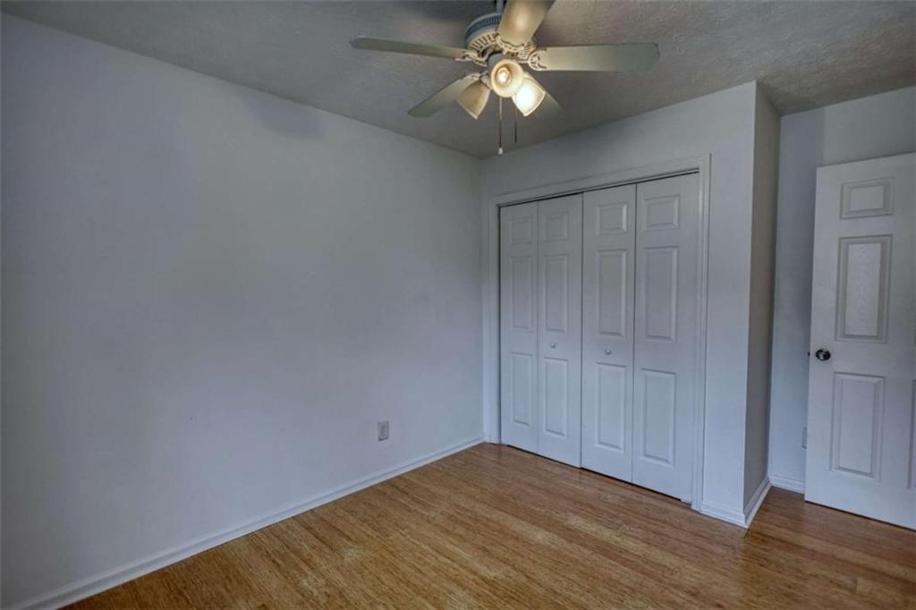 5185 Tew Lane Southwest Covington, GA 30014 - Photo 30 of 42 wooden floor in an empty room