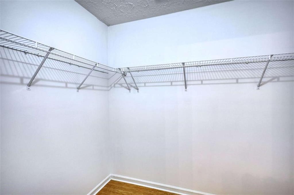 5185 Tew Lane Southwest Covington, GA 30014 - Photo 36 of 42 a view of a room with racks on the wall