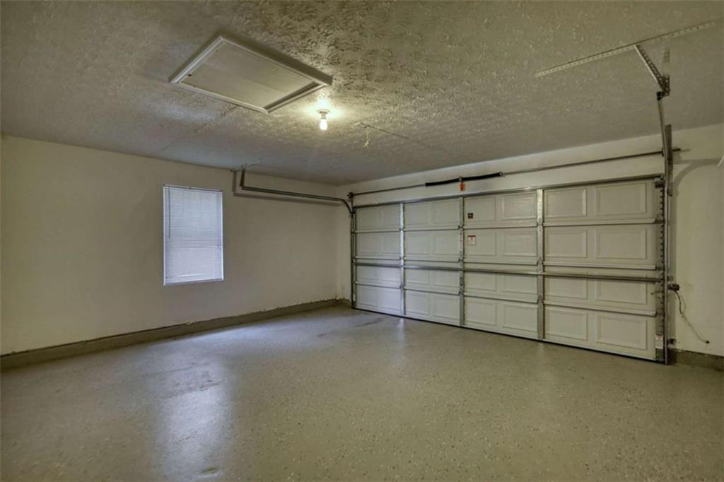 5185 Tew Lane Southwest Covington, GA 30014 - Photo 37 of 42 a view of a garage room