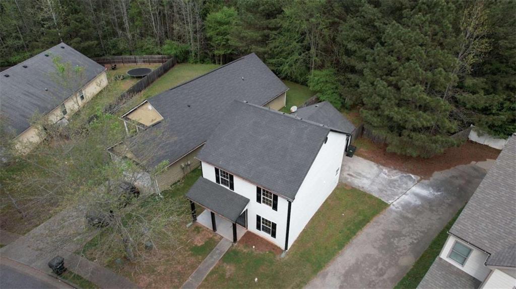 5185 Tew Lane Southwest Covington, GA 30014 - Photo 38 of 42 an aerial view of a house with a yard
