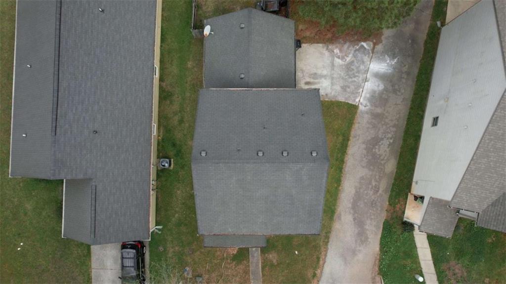 5185 Tew Lane Southwest Covington, GA 30014 - Photo 41 of 42 an aerial view of a house with a yard
