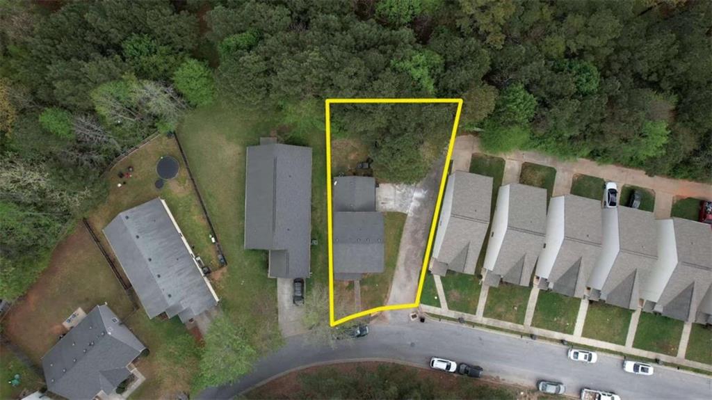 5185 Tew Lane Southwest Covington, GA 30014 - Photo 42 of 42 a view of a street with an outdoor seating