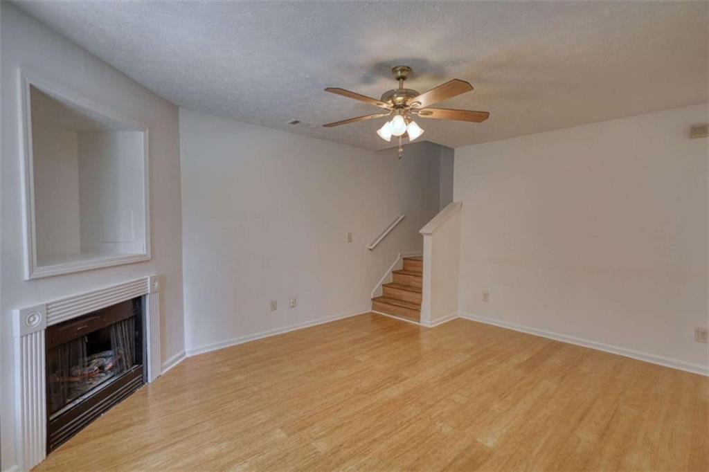 5185 Tew Lane Southwest Covington, GA 30014 - Photo 7 of 42 a view of empty room with fireplace