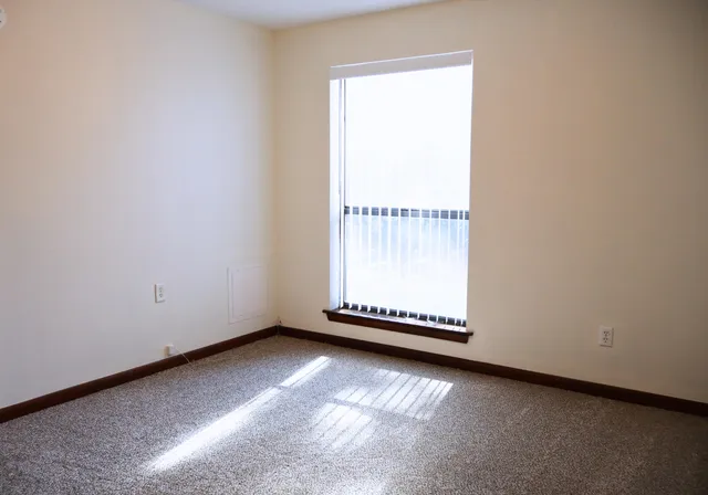 an empty room with a window
