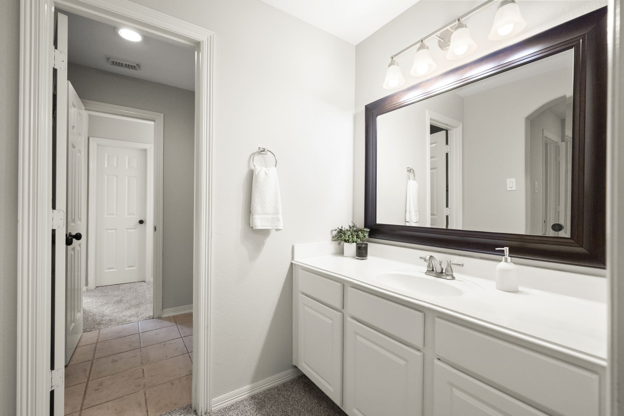 2326 Timbergreen Circle Magnolia, TX 77355 - Photo 34 of 43 a bathroom with a sink and a mirror