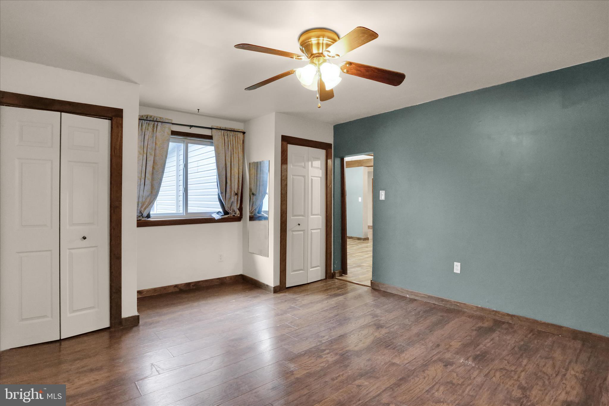 1039 Long Run Road Pine Grove, PA 17963 - Photo 12 of 34 an empty room with wooden floor and windows