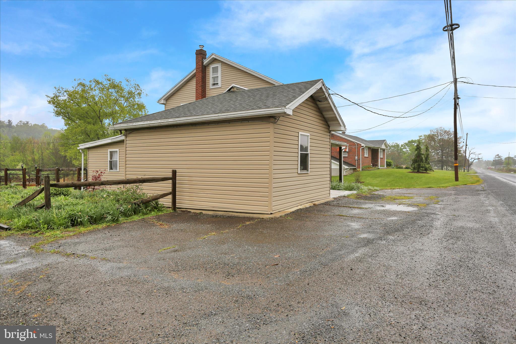 1039 Long Run Road Pine Grove, PA 17963 - Photo 31 of 34 a view of a house with a yard and garage