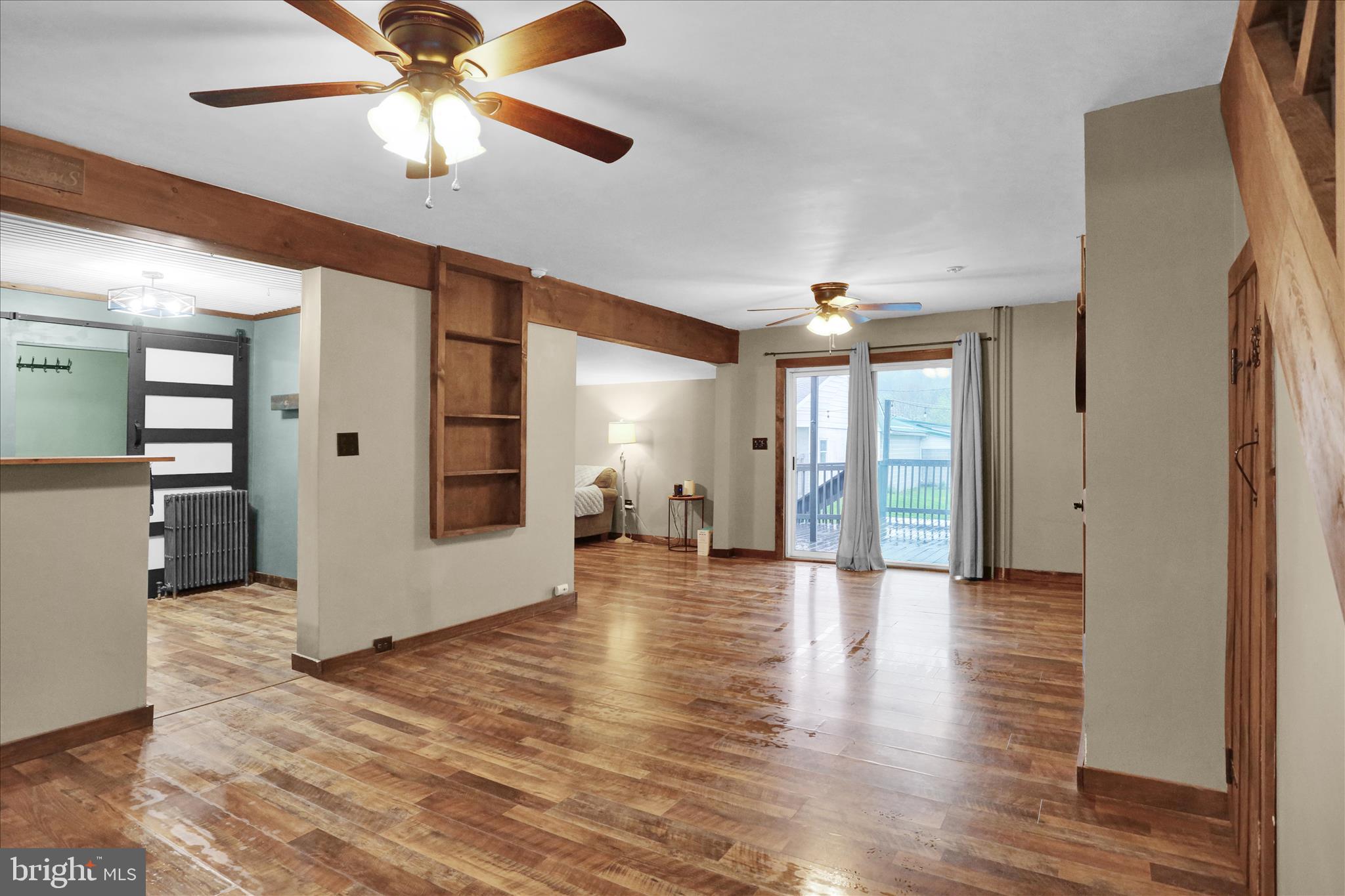 1039 Long Run Road Pine Grove, PA 17963 - Photo 4 of 34 a view of an empty room with wooden floor and a ceiling fan