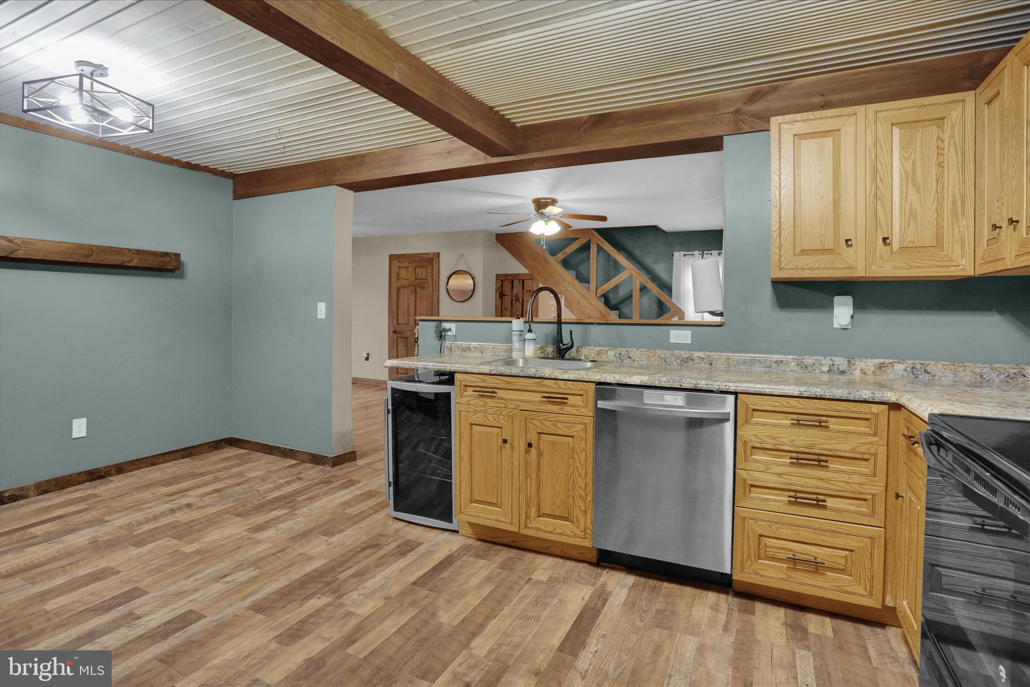 1039 Long Run Road Pine Grove, PA 17963 - Photo 7 of 34 a kitchen with granite countertop a sink cabinets and stainless steel appliances