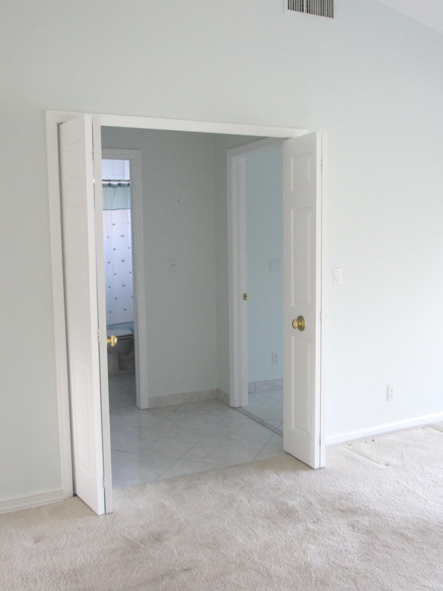 6752 Montego Bay Boulevard, Unit B Boca Raton, FL 33433 - Photo 18 of 36 Doorway to Master