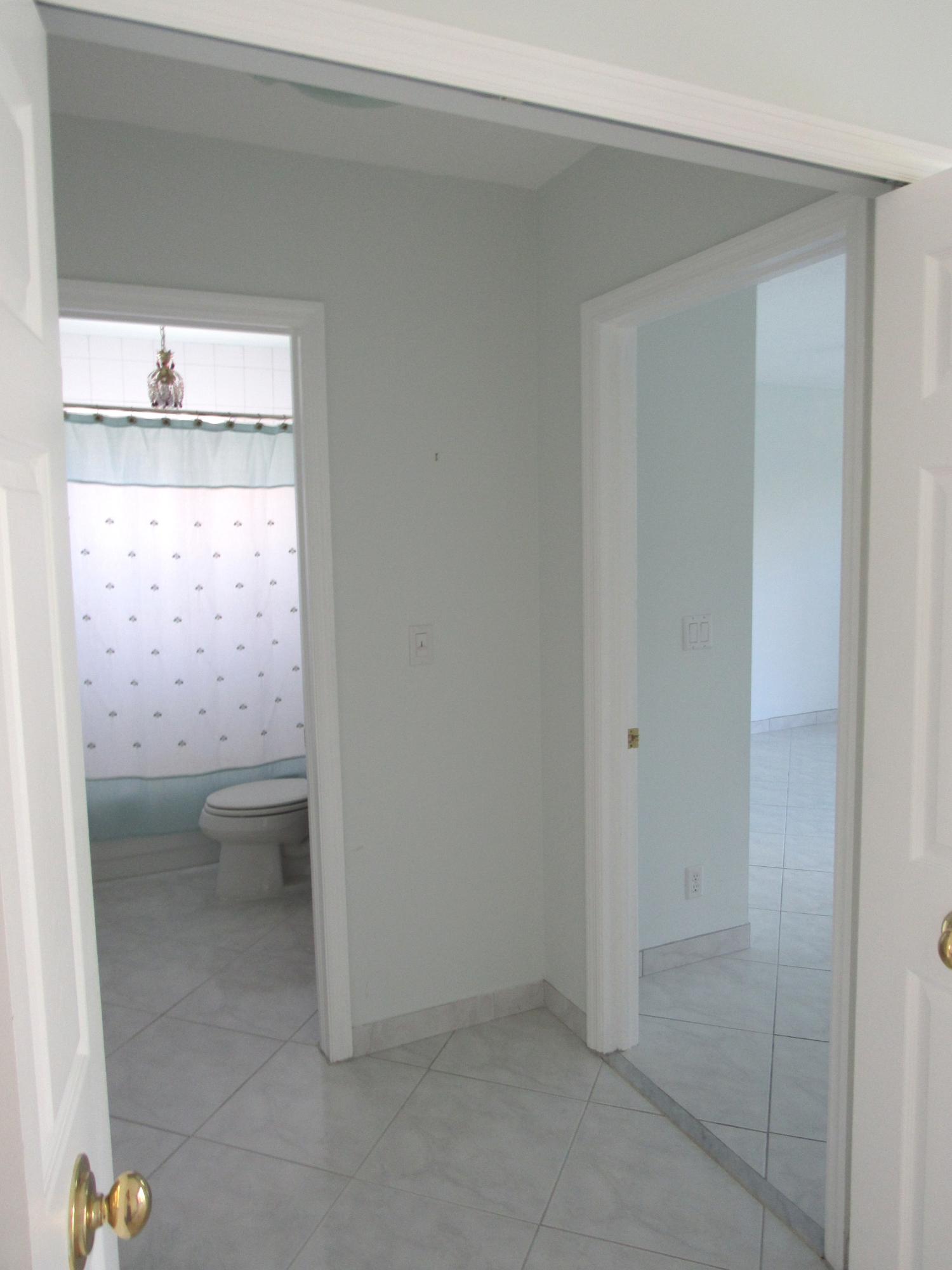 6752 Montego Bay Boulevard, Unit B Boca Raton, FL 33433 - Photo 28 of 36 Secondary Bath Foyer