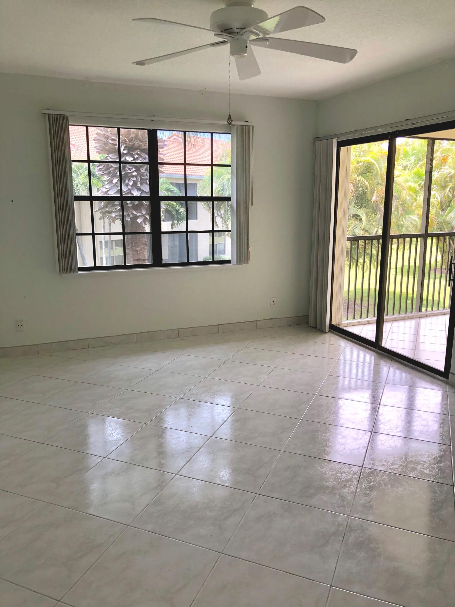 6752 Montego Bay Boulevard, Unit B Boca Raton, FL 33433 - Photo 7 of 36 Living Area to Enclosed Balcony