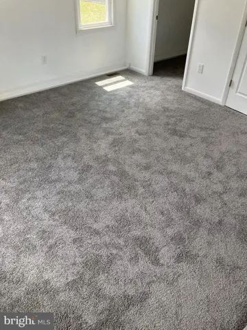 a view of empty room with window