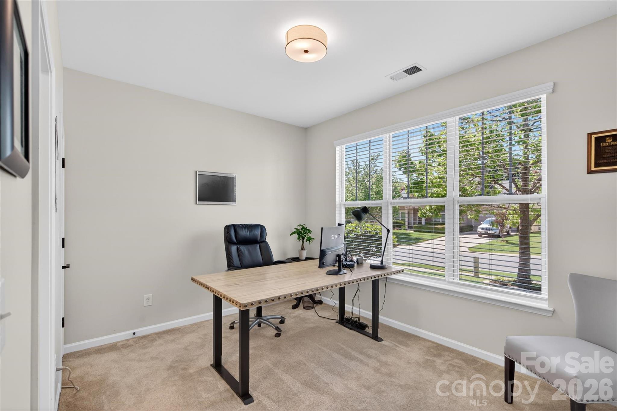 6038 Durango Way Denver, NC 28037 - Photo 4 of 20 a workspace with furniture and a window