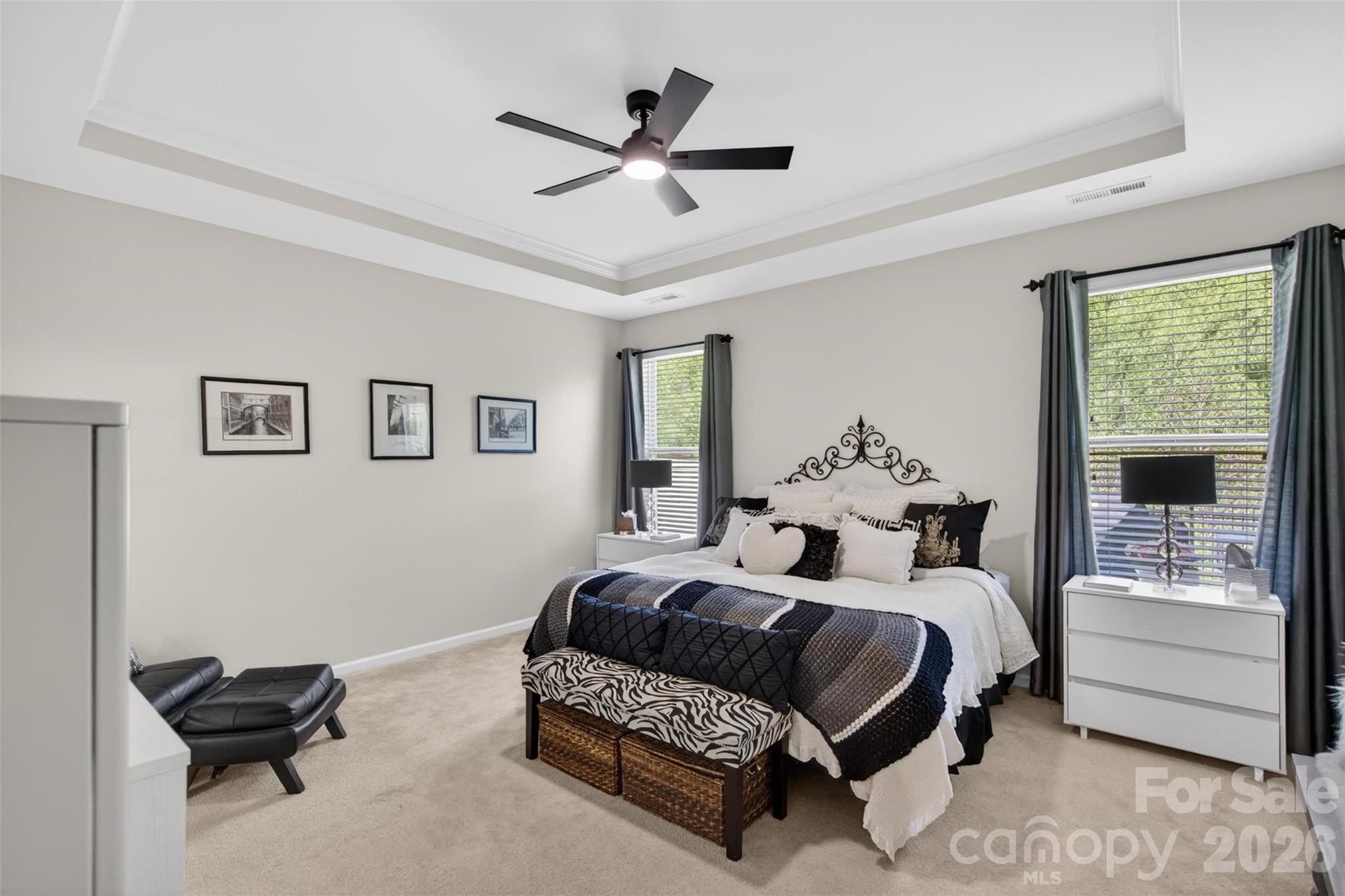 6038 Durango Way Denver, NC 28037 - Photo 10 of 20 a bedroom with a bed and a couch