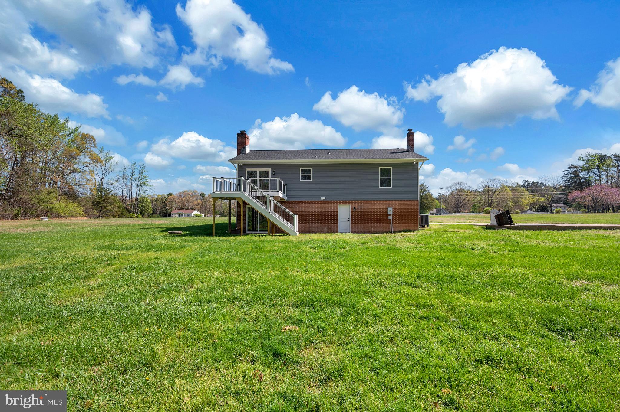 13452 Post Oak Road Spotsylvania, VA 22551 - Photo 13 of 56 a view of a house with a big yard