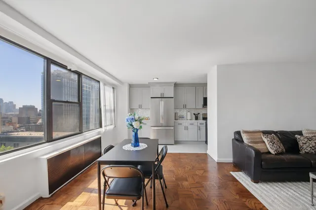 a kitchen with a refrigerator stove and a sink