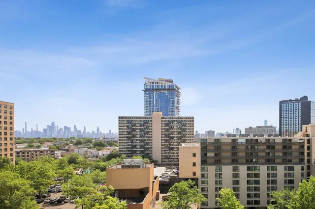 a view of a city with tall buildings