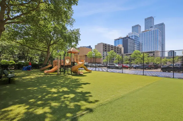 a view of a swimming pool with a lounge chair