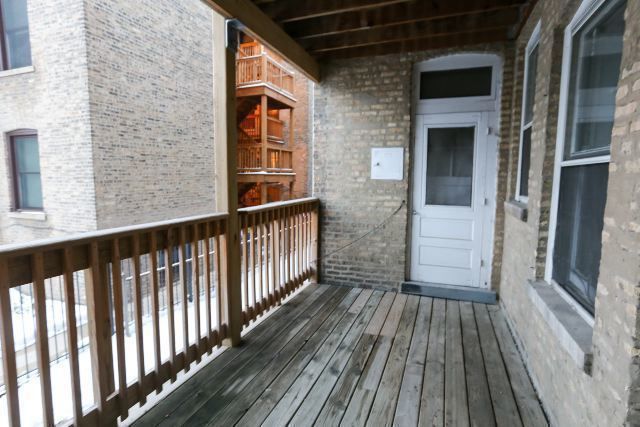 1921 West Winnemac Avenue, Unit 1 Chicago, IL 60640 - Photo 14 of 14 a view of wooden balcony