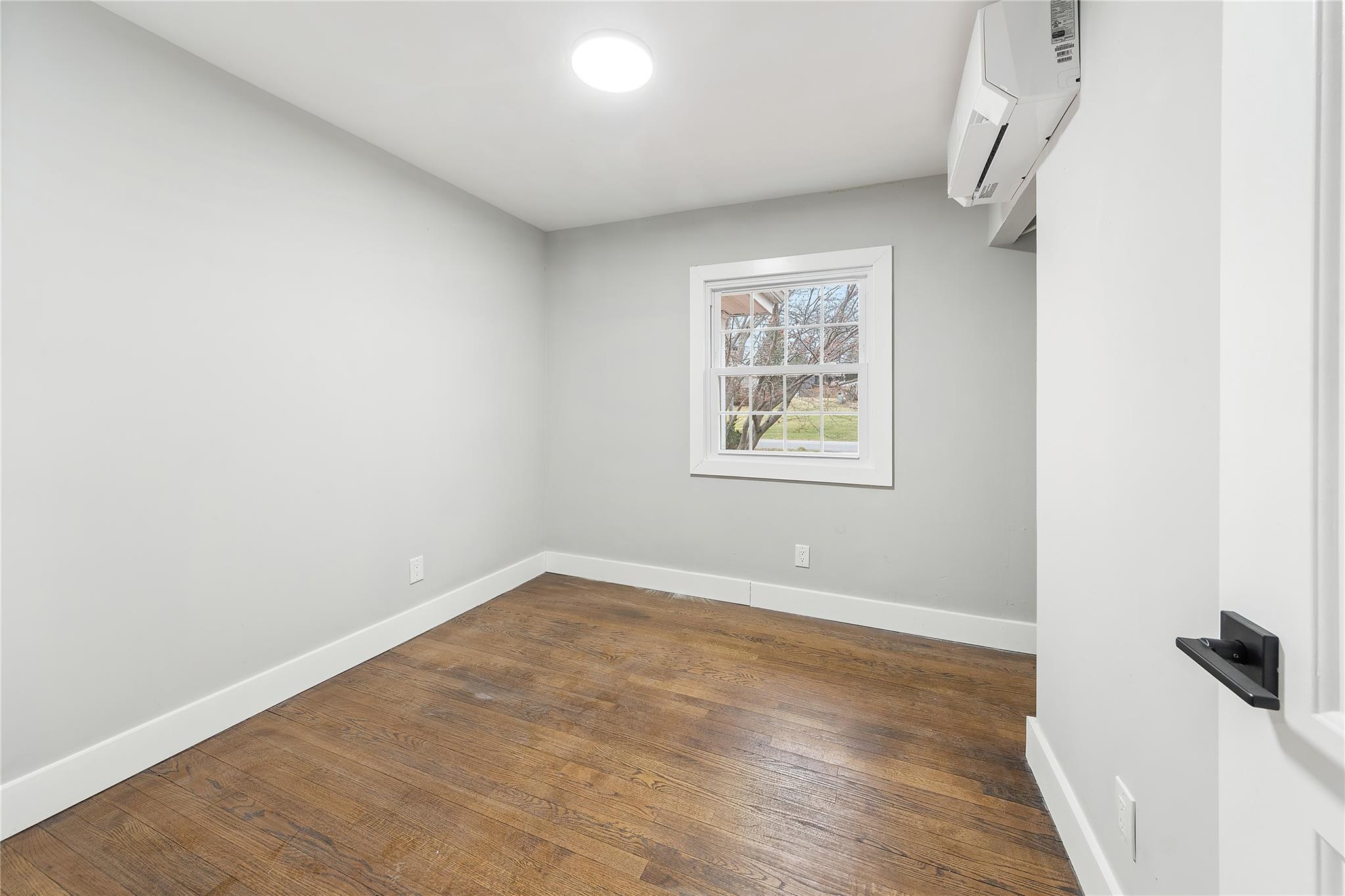 96 Fairmont Road Mahopac, NY 10541 - Photo 16 of 29 an empty room with wooden floor and windows