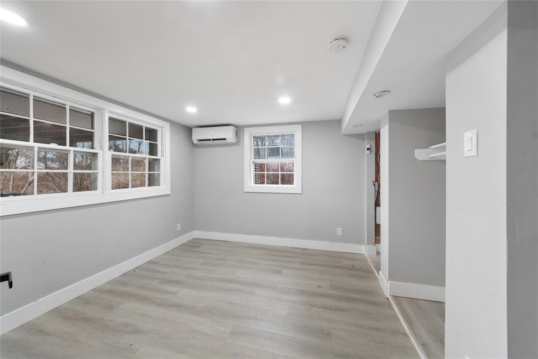 96 Fairmont Road Mahopac, NY 10541 - Photo 18 of 29 a view of empty room with windows and wardrobe