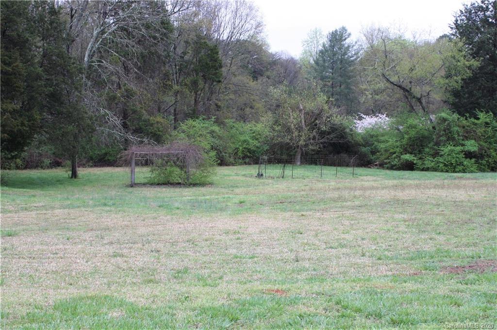 1095 Lawrence Road Clover, SC 29710 - Photo 12 of 20 a view of a field with trees in background