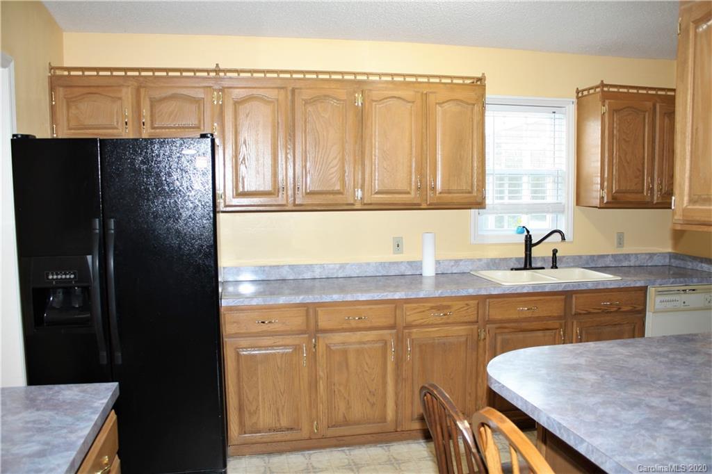 1095 Lawrence Road Clover, SC 29710 - Photo 6 of 20 a kitchen with a sink and cabinets