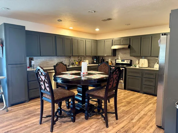 a view of a dining room with furniture