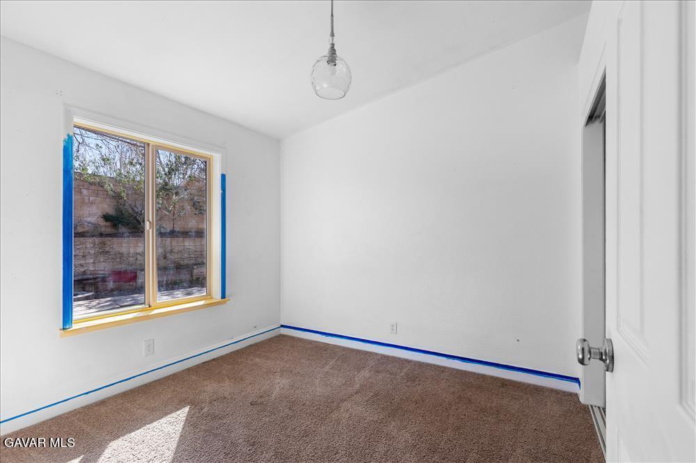114 Chaparrel Street Tehachapi, CA 93561 - Photo 18 of 31 a view of an empty room with a window