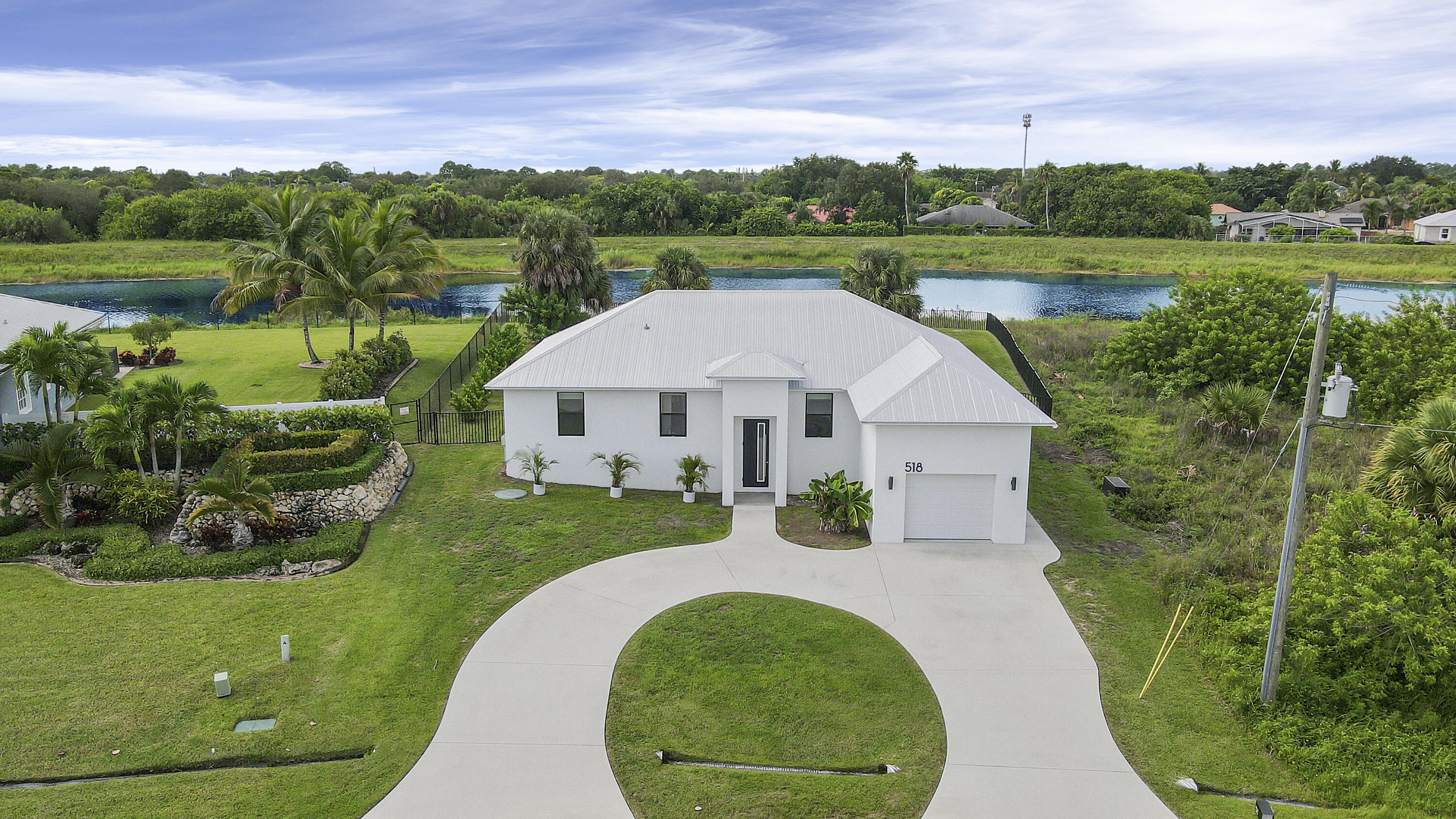 518 Southwest Aster Road Port St. Lucie, FL 34953 - Photo 2 of 54 Front