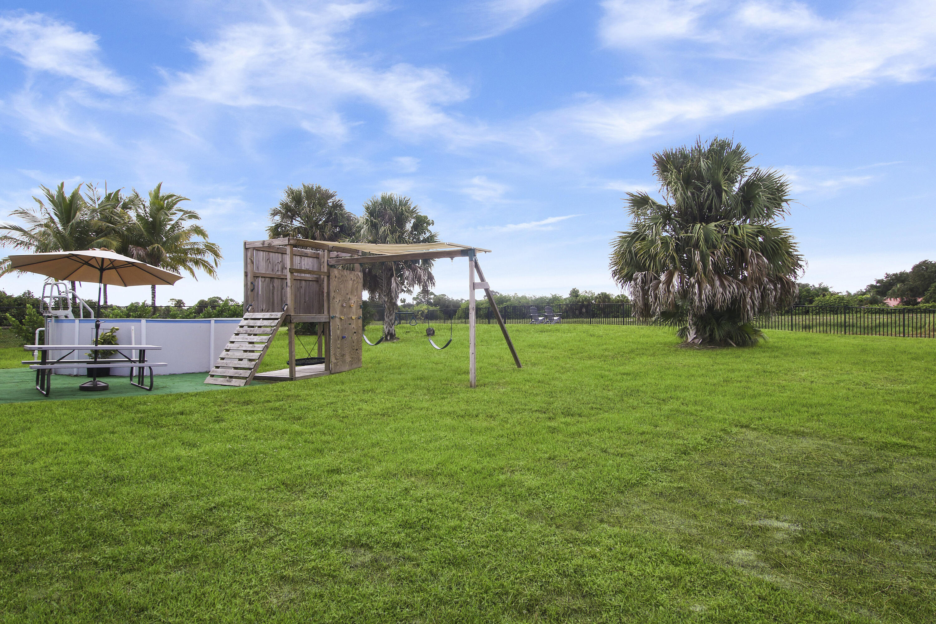518 Southwest Aster Road Port St. Lucie, FL 34953 - Photo 51 of 54 Swing Set