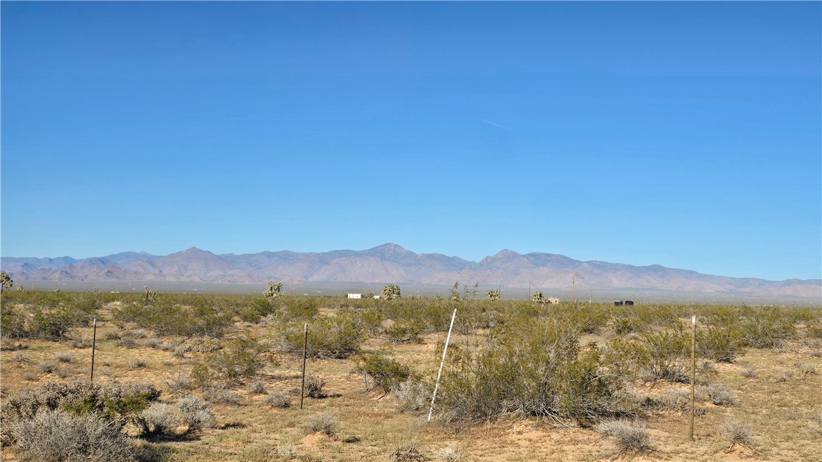 21688 South Roy Rogers Road Yucca, AZ 86438 - Photo 13 of 36 a view of a city with mountain