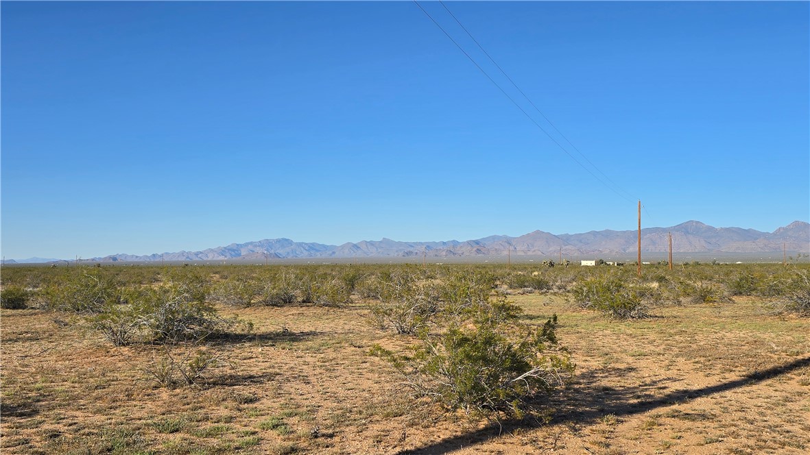 21688 South Roy Rogers Road Yucca, AZ 86438 - Photo 25 of 36 a view of an ocean and a mountain