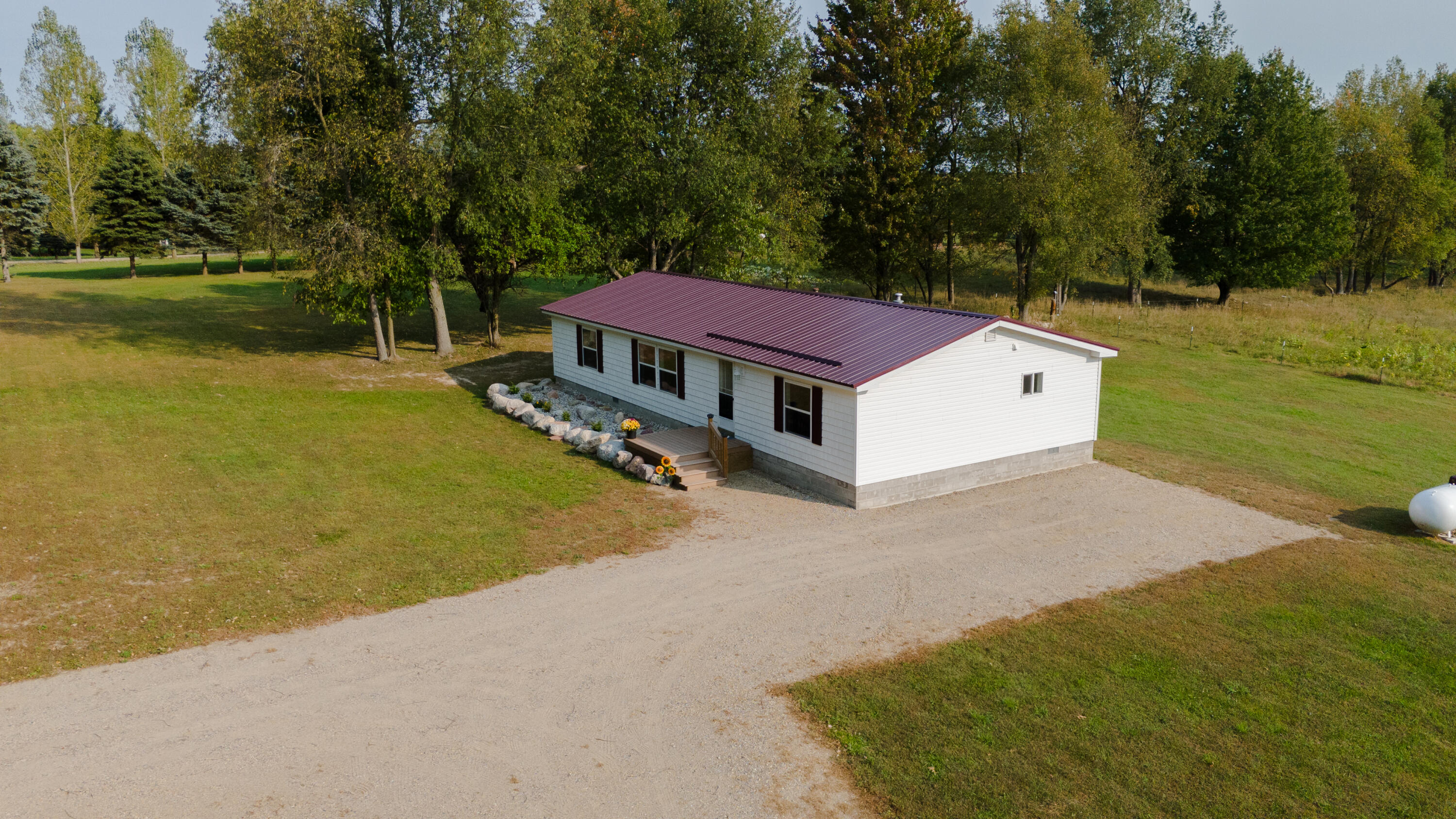 10143 West Jordan Road Remus, MI 49340 - Photo 1 of 45 10143 1.3 (2)