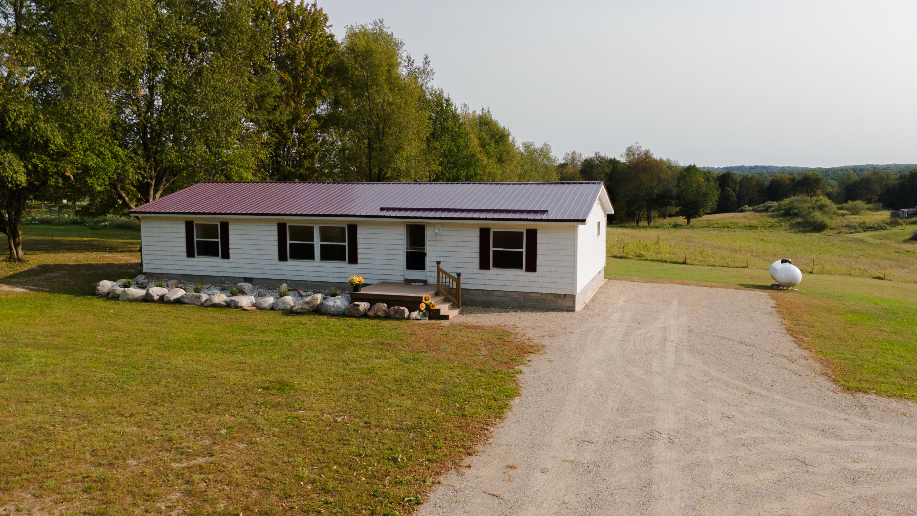 10143 West Jordan Road Remus, MI 49340 - Photo 2 of 45 10143 1.4 (2)