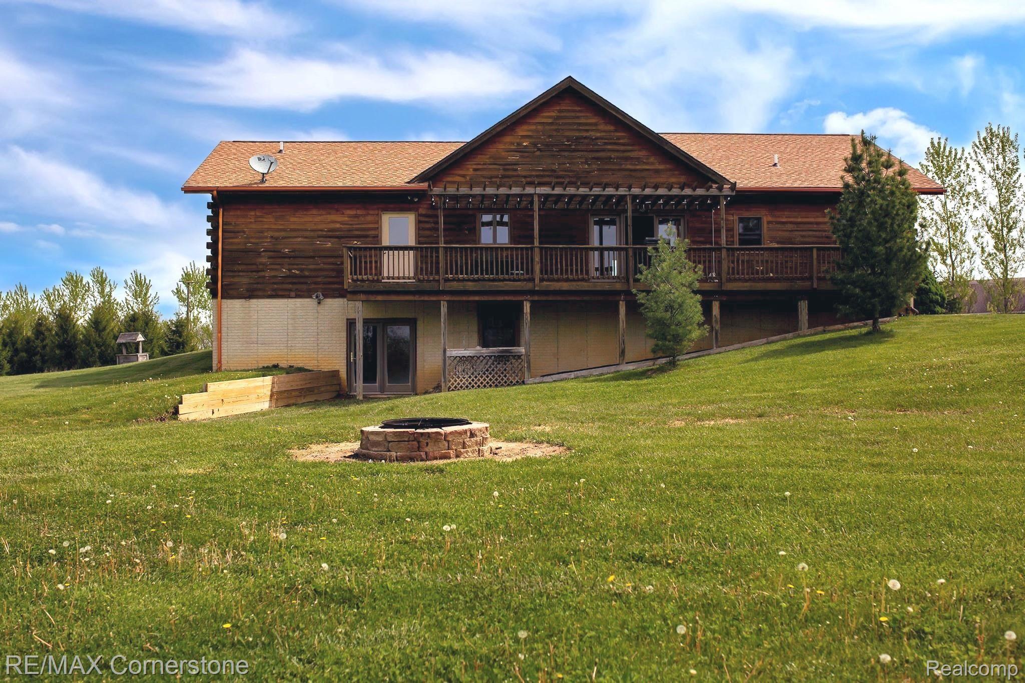 11737 Hoelzer Road Clinton, MI 49236 - Photo 3 of 19 Back of house.JPG