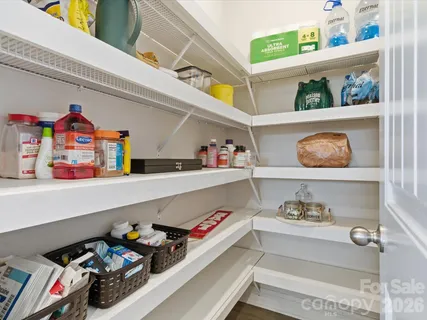 a utility room with lots of clutter and lots of clutter
