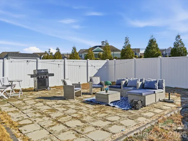 a view of a terrace with furniture