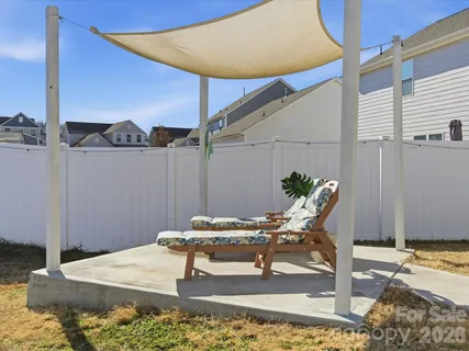 a view of a terrace with furniture