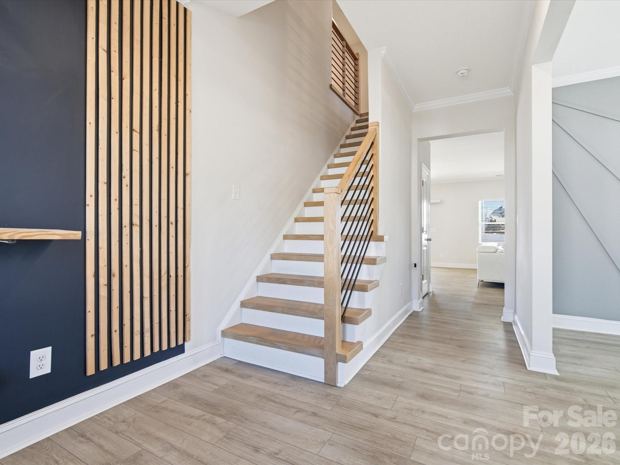 4435 Allenby Place Monroe, NC 28110 - Photo 3 of 32 a view of a hallway with wooden floor and entryway