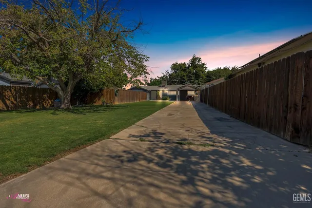 a view of a backyard with a garden