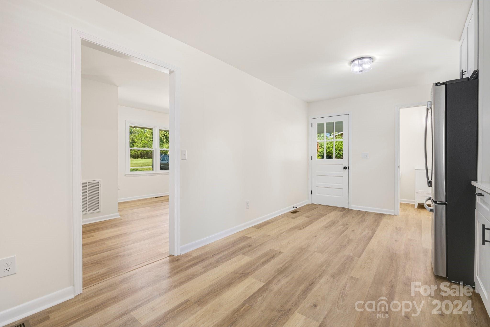 815 Poors Ford Road Rutherfordton, NC 28139 - Photo 15 of 30 wooden floor in an empty room with a window