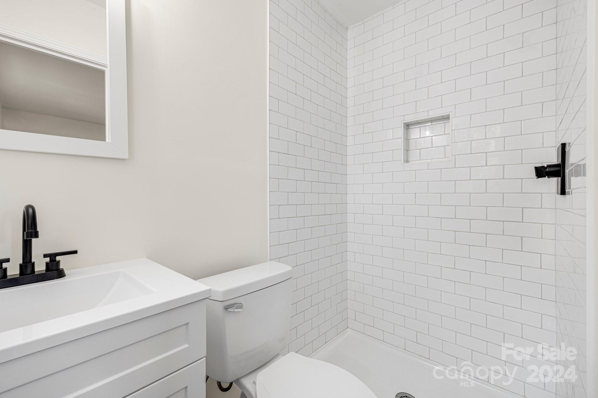 815 Poors Ford Road Rutherfordton, NC 28139 - Photo 21 of 30 a bathroom with a toilet and sink