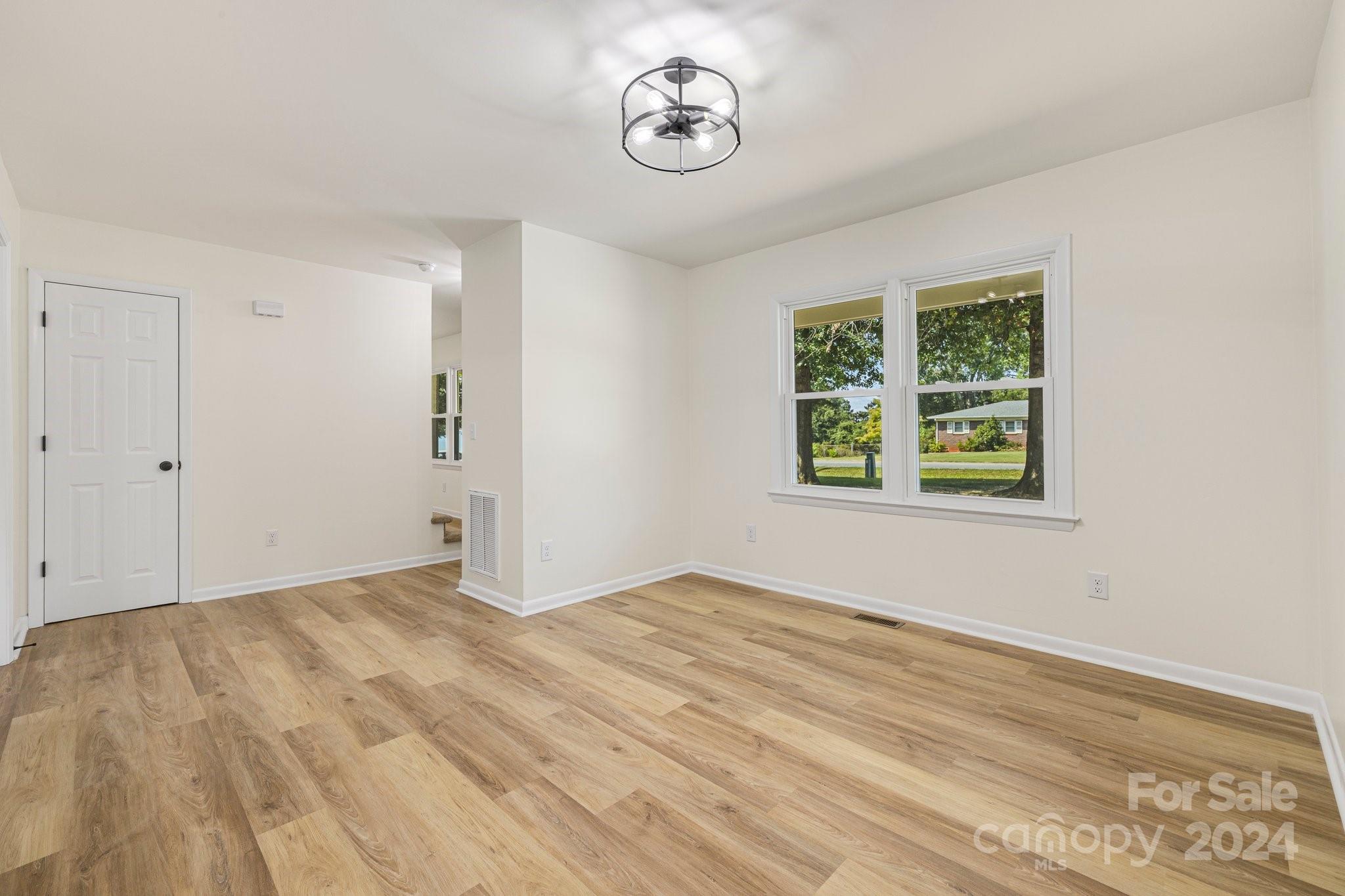 815 Poors Ford Road Rutherfordton, NC 28139 - Photo 9 of 30 an empty room with windows