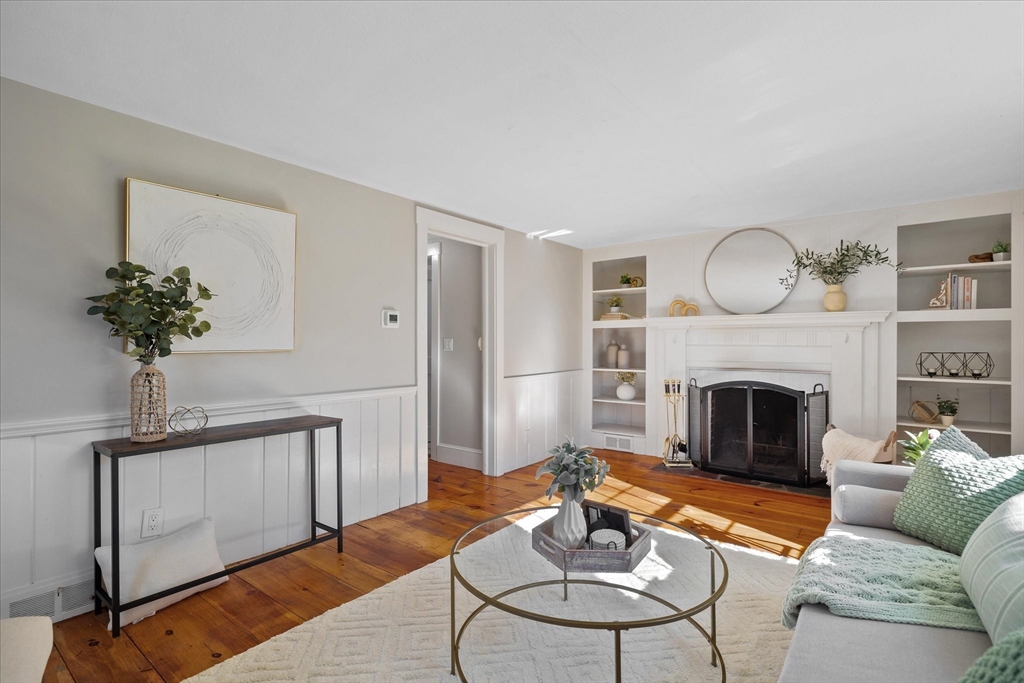 85 Franklin Road Longmeadow, MA 01106 - Photo 14 of 32 a living room with furniture a chandelier and a fireplace