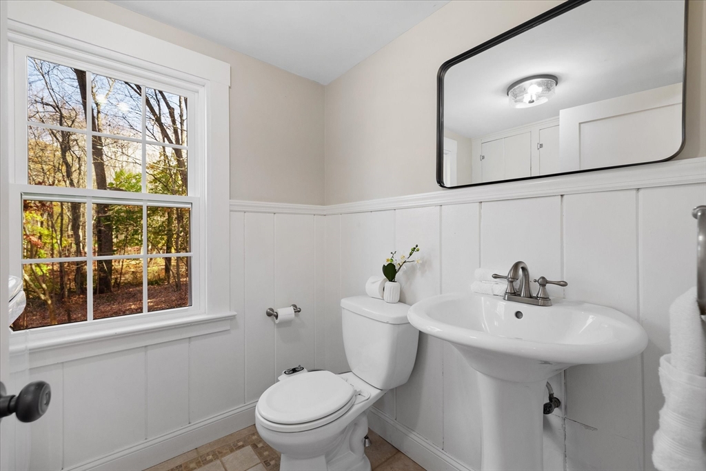 85 Franklin Road Longmeadow, MA 01106 - Photo 18 of 32 a bathroom with a sink mirror and toilet