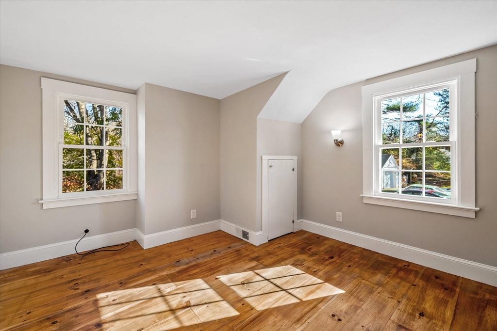 85 Franklin Road Longmeadow, MA 01106 - Photo 22 of 32 a view of a room that has a bed and a window in it