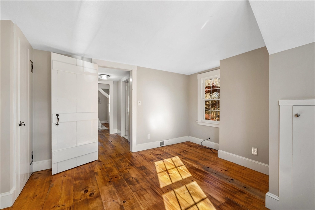 85 Franklin Road Longmeadow, MA 01106 - Photo 23 of 32 a bedroom with a bed and a window