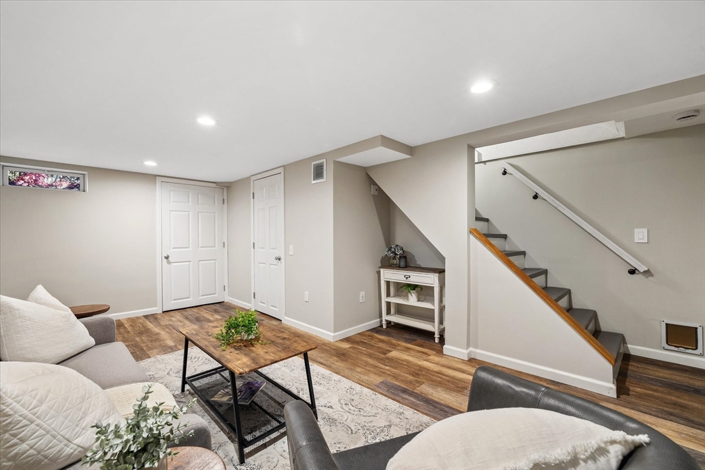 85 Franklin Road Longmeadow, MA 01106 - Photo 26 of 32 a living room with furniture and stairs